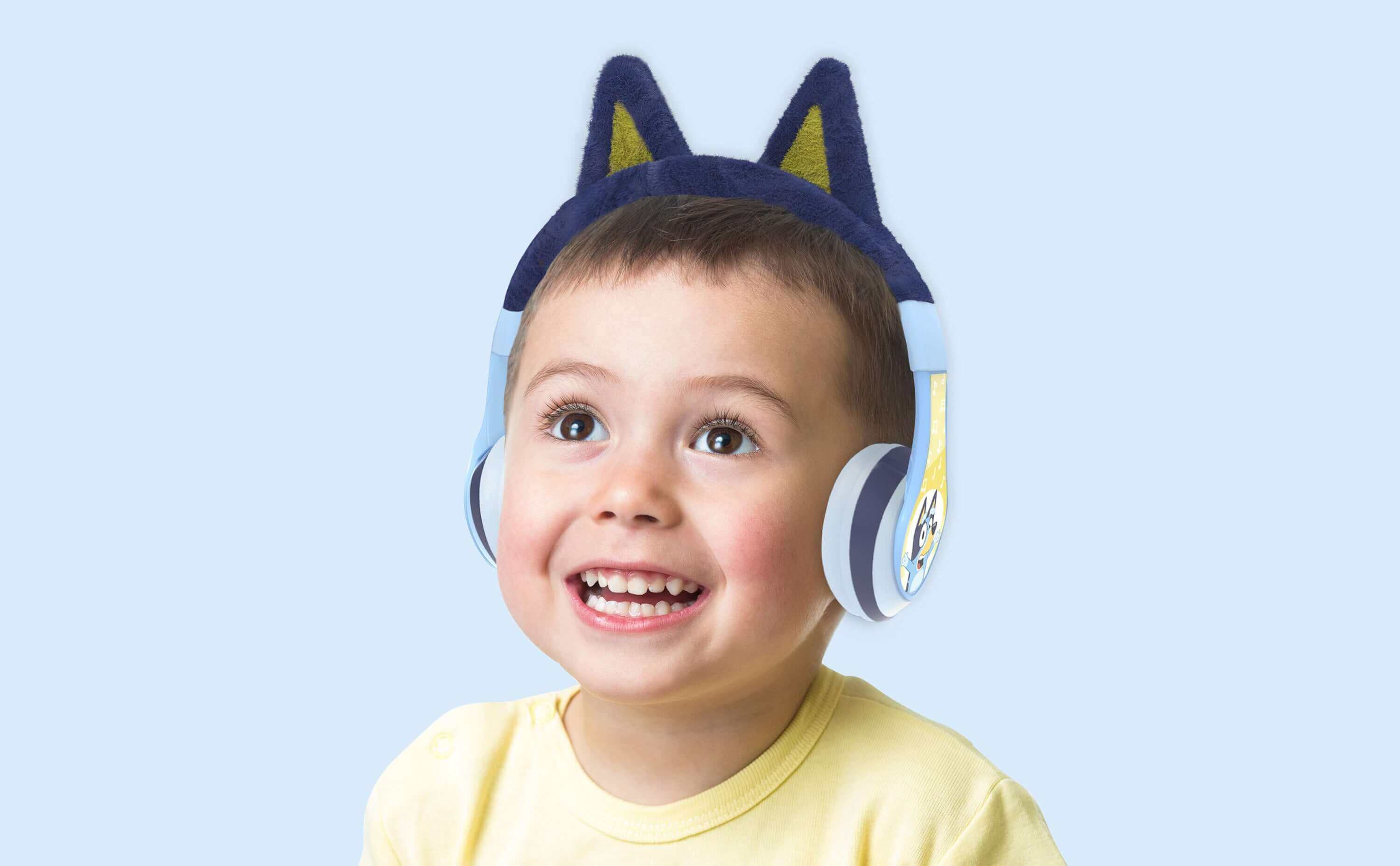 Little boy with discount headphones